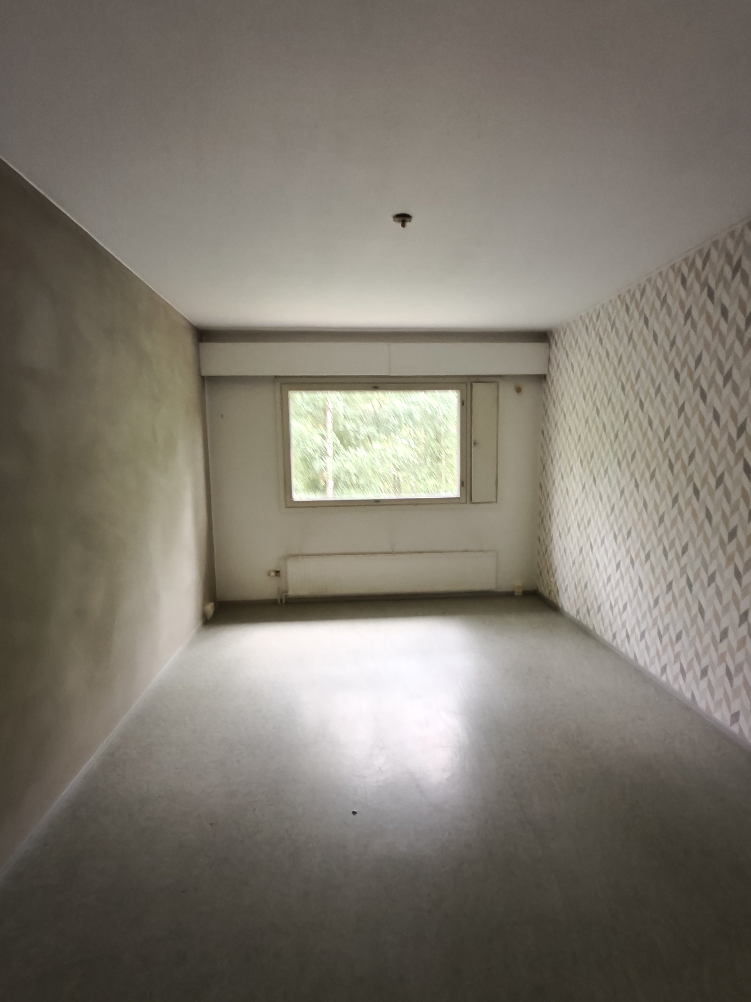 Ylimmän kerroksen valoisa kolmio, päätyasunto 2